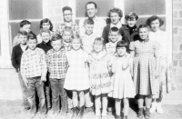 THESE STUDENTS posed in front of the Hobart Prairie School sometime in the mid-1950s. Pictured are: (front row, from left) Bobby Williams, Larry Conyac, Paulette Hrabe, Ruth Schilowsky and ????; (middle row) Roger Schilowsky, Emery Schilowsky, Vane Maddy, Richard Williams, Verlyn Maddy, DaisyWildrex; (back row) Raymond Kriley, Linda Eagon, Donald Maddy, teacher (name unknown), Ann Hrabe, Bernita Byerly, and Shirley Wildrex.