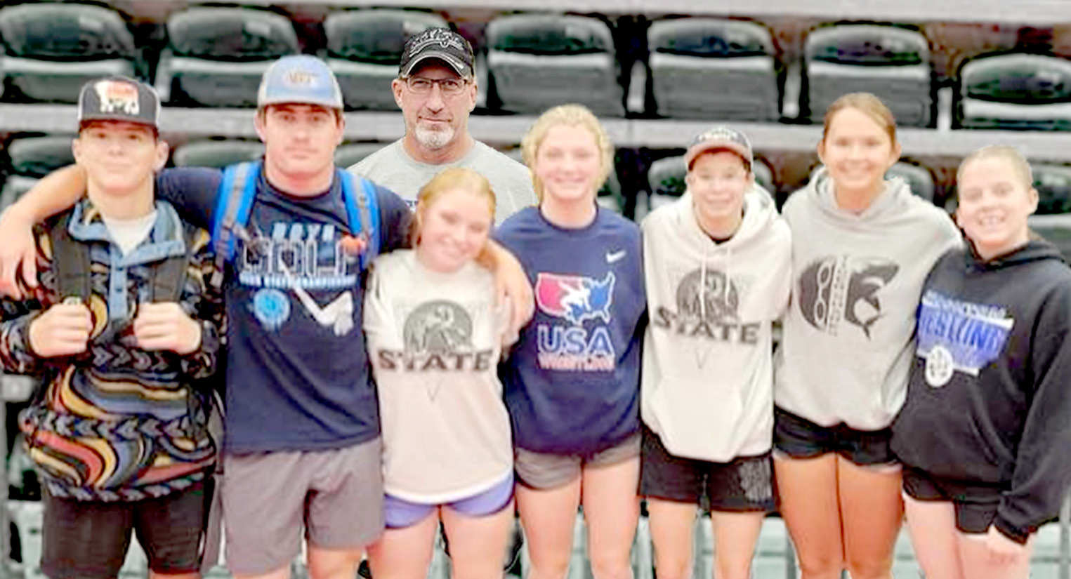 Tiger Wrestlers attending UNK’s camp were, from left: Calder Elmer, Emerson Lowry, Coach Clint Bedore, Aiyden Kerr, Ashlyn Hahn, Carolina Northup, Shae Yohon and Mia Odle.