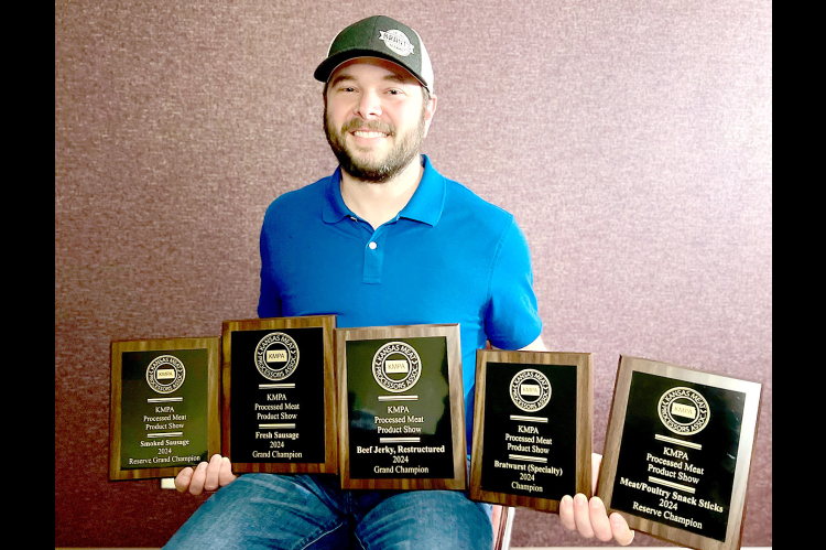 ADAM COMEAU OF PLAINVILLE, owner of Brant’s Market along with his wife Ashley, brought home more than a handful of awards at the 84th Kansas Meat Processors Association Convention &amp; Trade Show held recently in Manhattan.